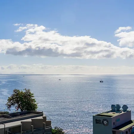 Rodamar Ii By An Island *